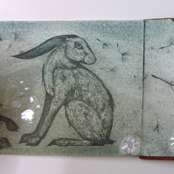 Husk - a hand printed concertina book